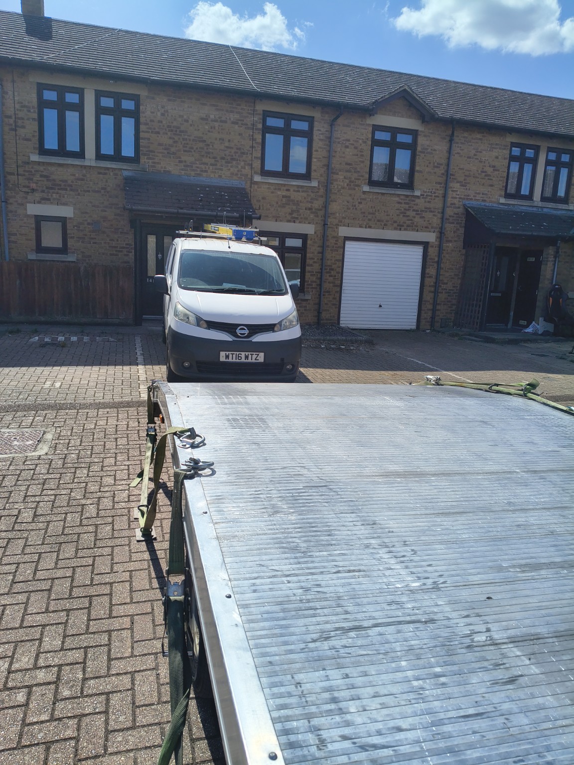Van loaded onto a recovery trailer near the A420 at Faringdon