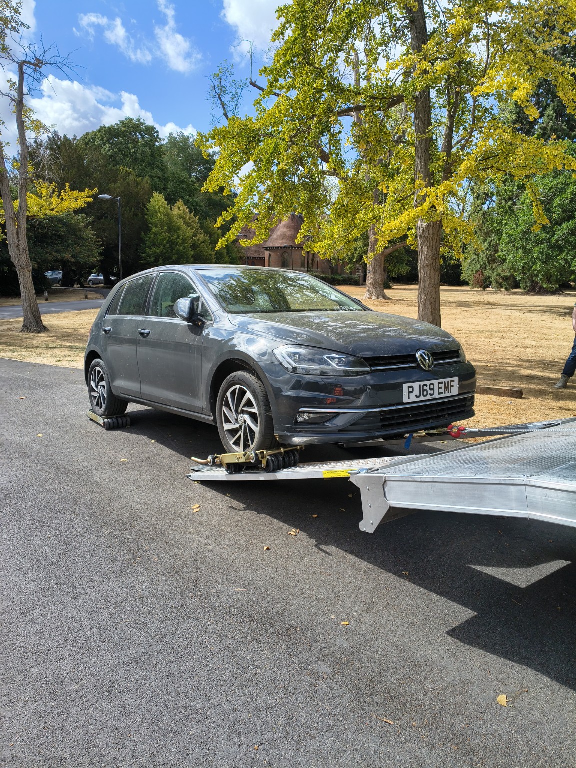 Volkswagen Golf being loaded onto a recovery trailer after keys were lost